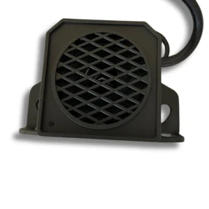 Compact black reversing alarm unit for vans and motorhomes with protective grille and mounting bracket.